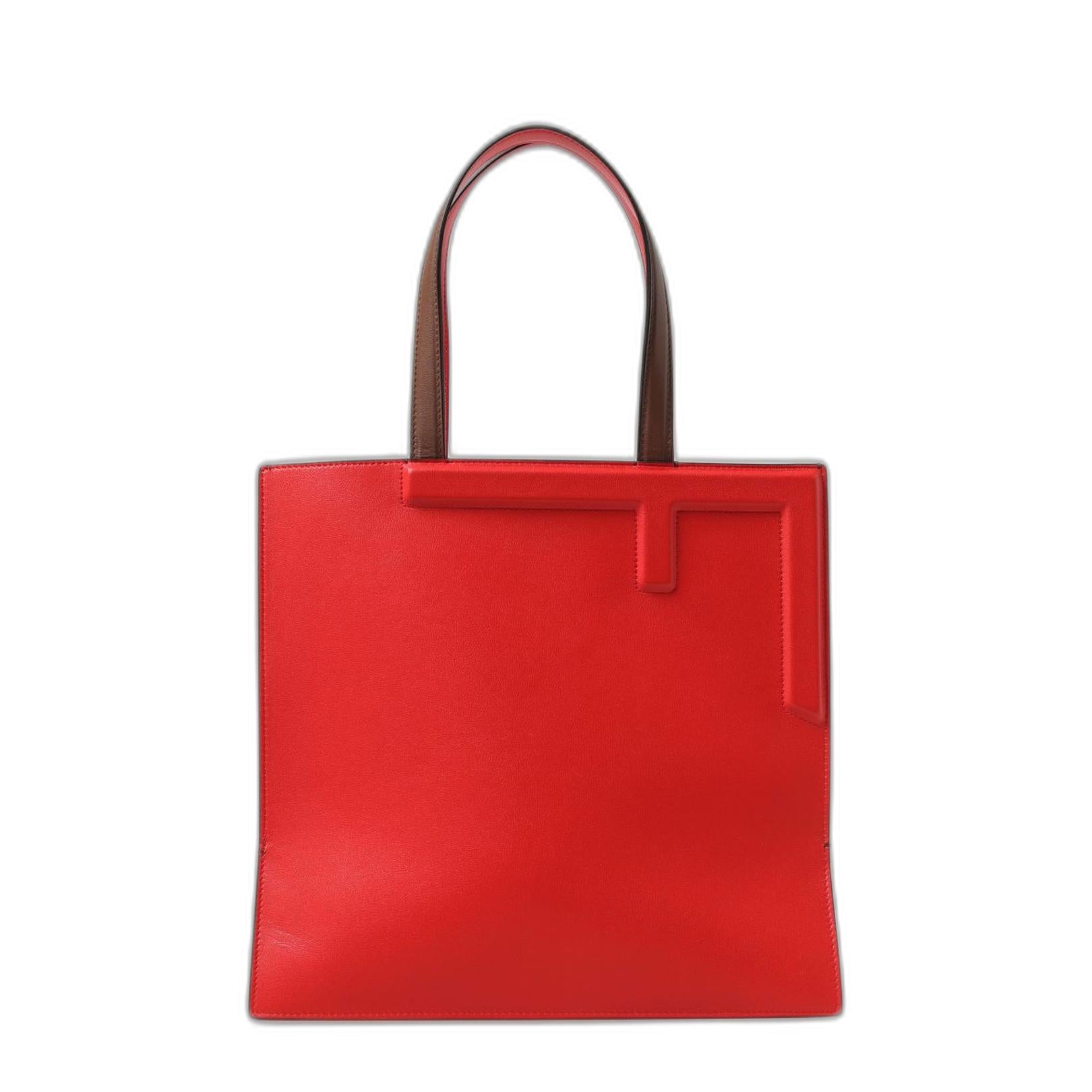 Flip Medium
Red Logo Embossed Leather Tote Bag - Image 1