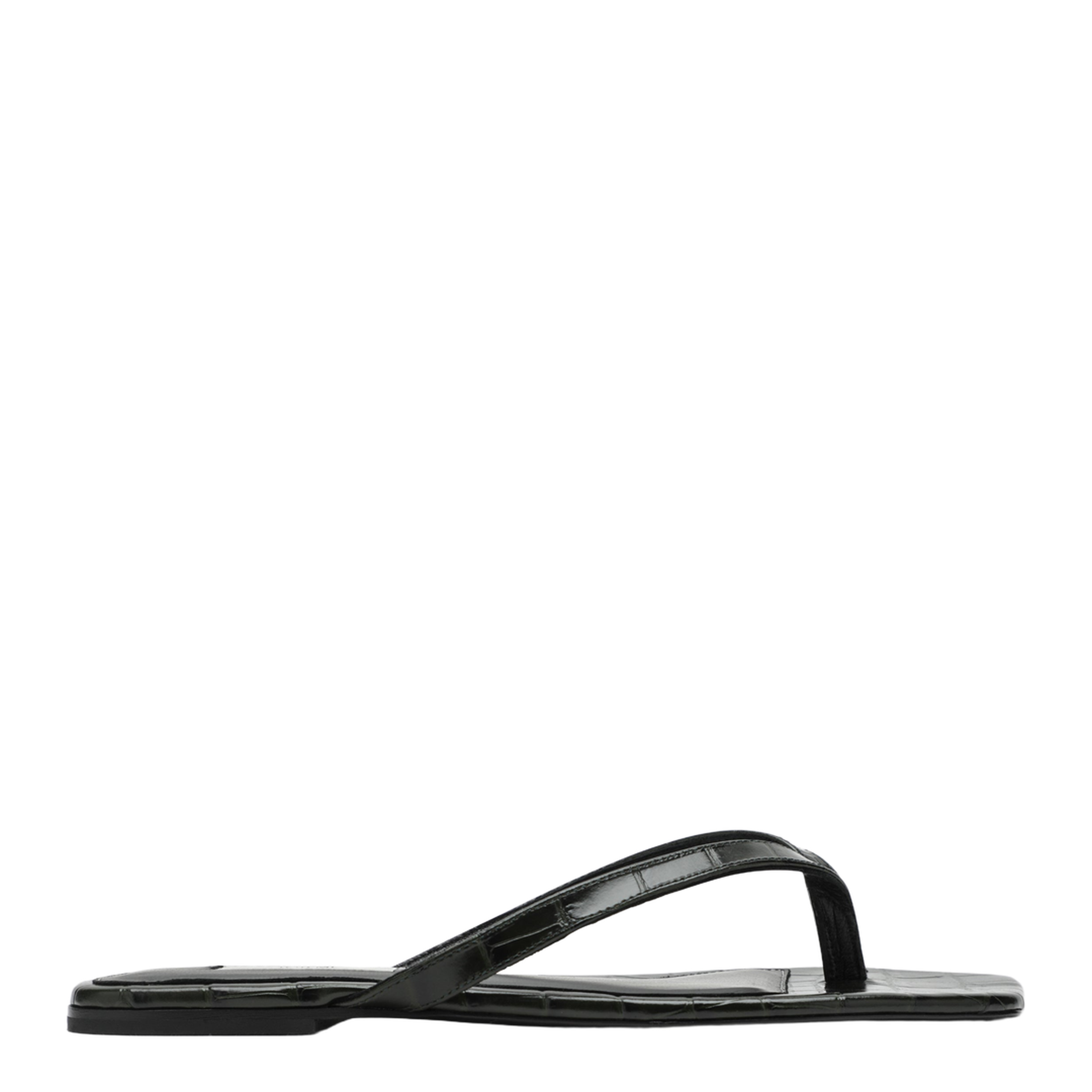 Crocodile-effect leather flip-flops in green - Image 1